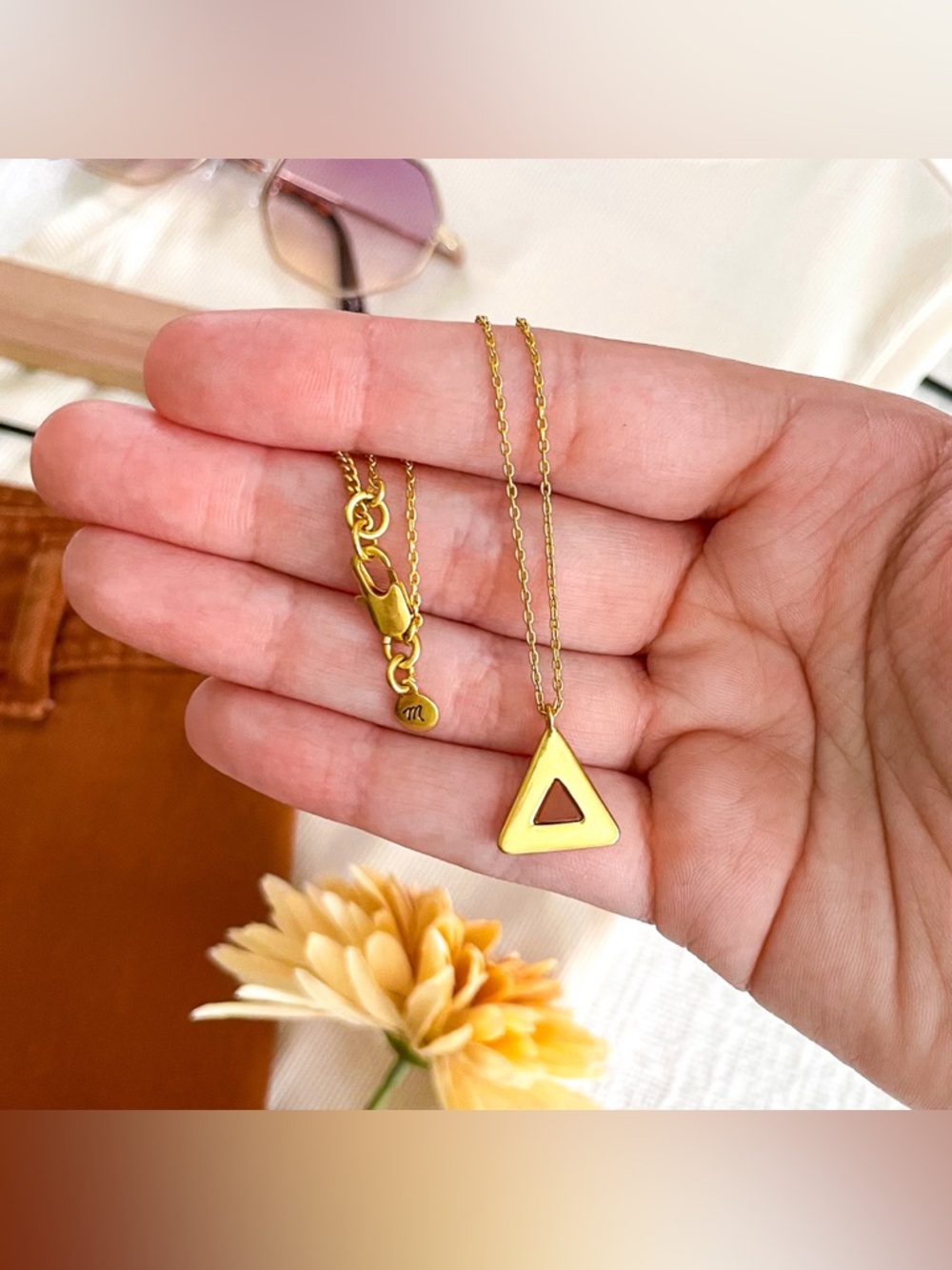 Madewell triangle necklace.